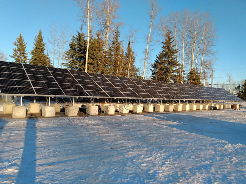 How to install the solar panel mounting structures to reduce snow accumulation on the solar panel